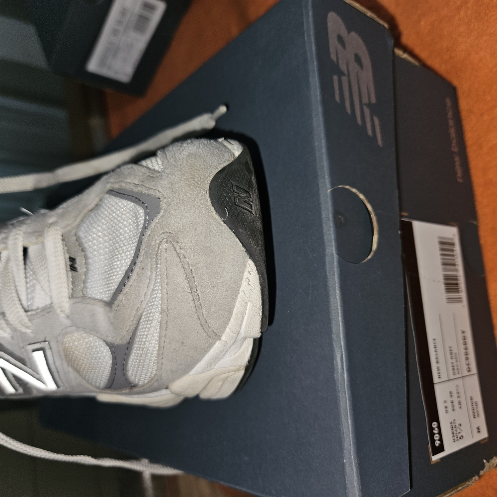 New Balance Classic White and Black Sneakers